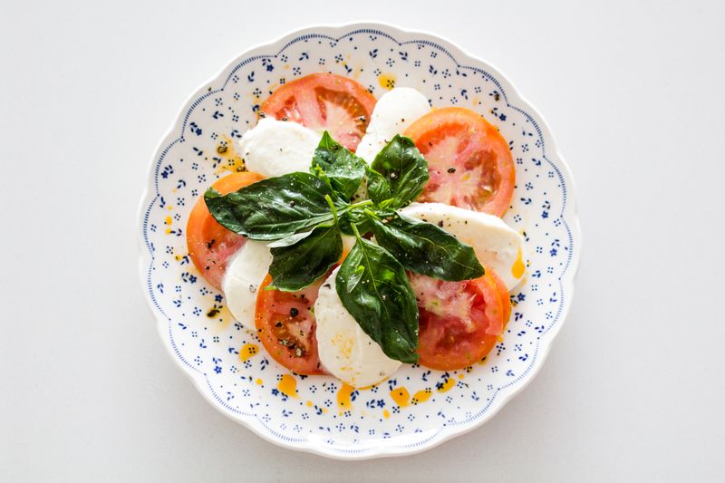 Burrata Caprese with fresh burrata and heirloom tomatoes