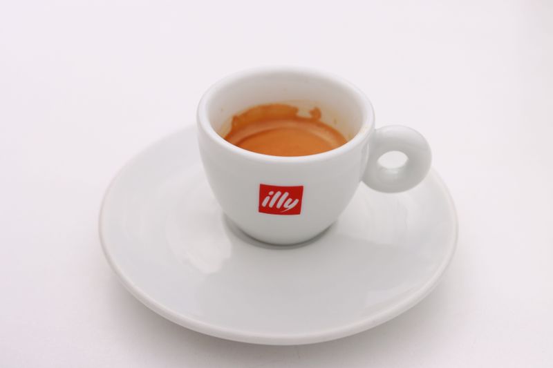 Italian espresso coffee served in ceramic cup